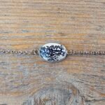 Bracelet argenté à fleurs noires – Dentelle d’Encre