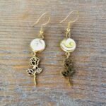 Boucles d’oreilles pendantes – Volutes Dorées
